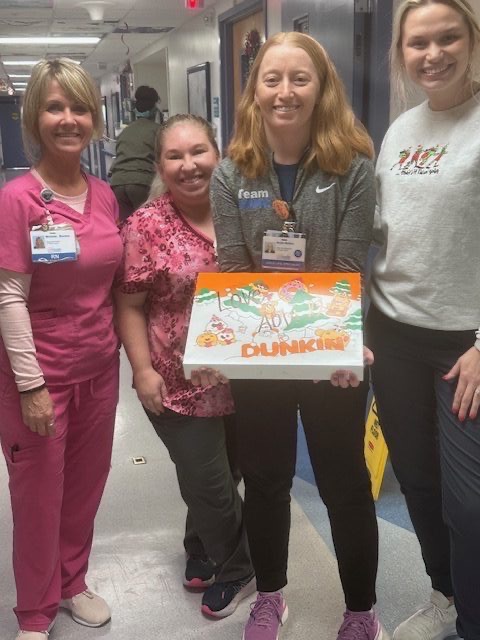Hospital staff with Love Abbi donation box